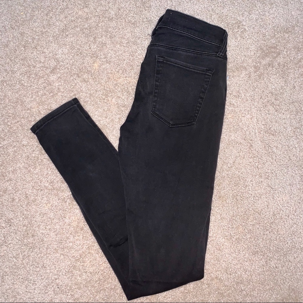 PACSUN Ripped Super Stretch Jeggings in Black